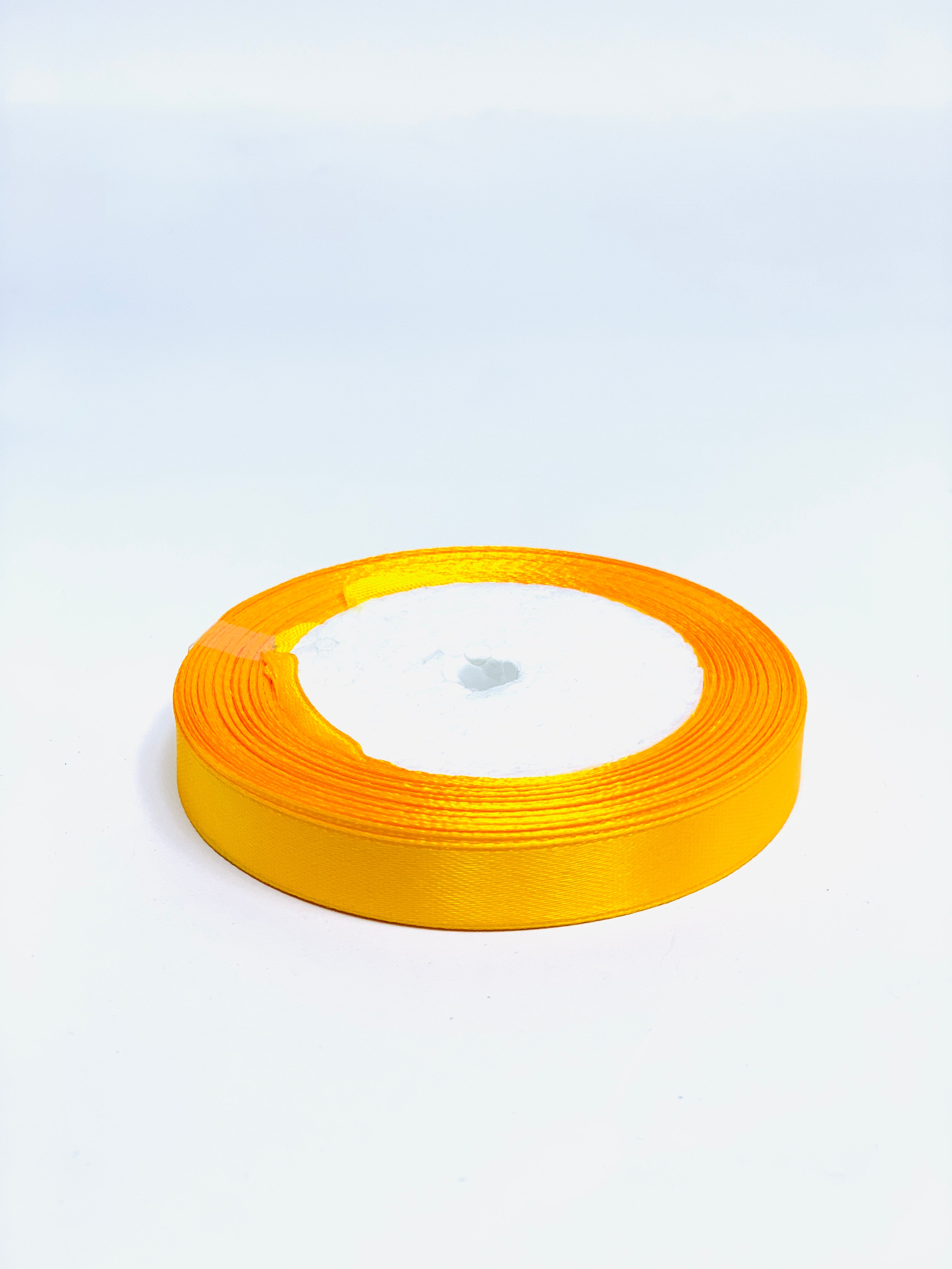 LIGHT ORANGE RIBBON 1 CM 25 YDS – AL NAHAR STATIONERY