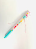 ALPHABETS  BEADS DESIGN  PEN BLUE WRITING